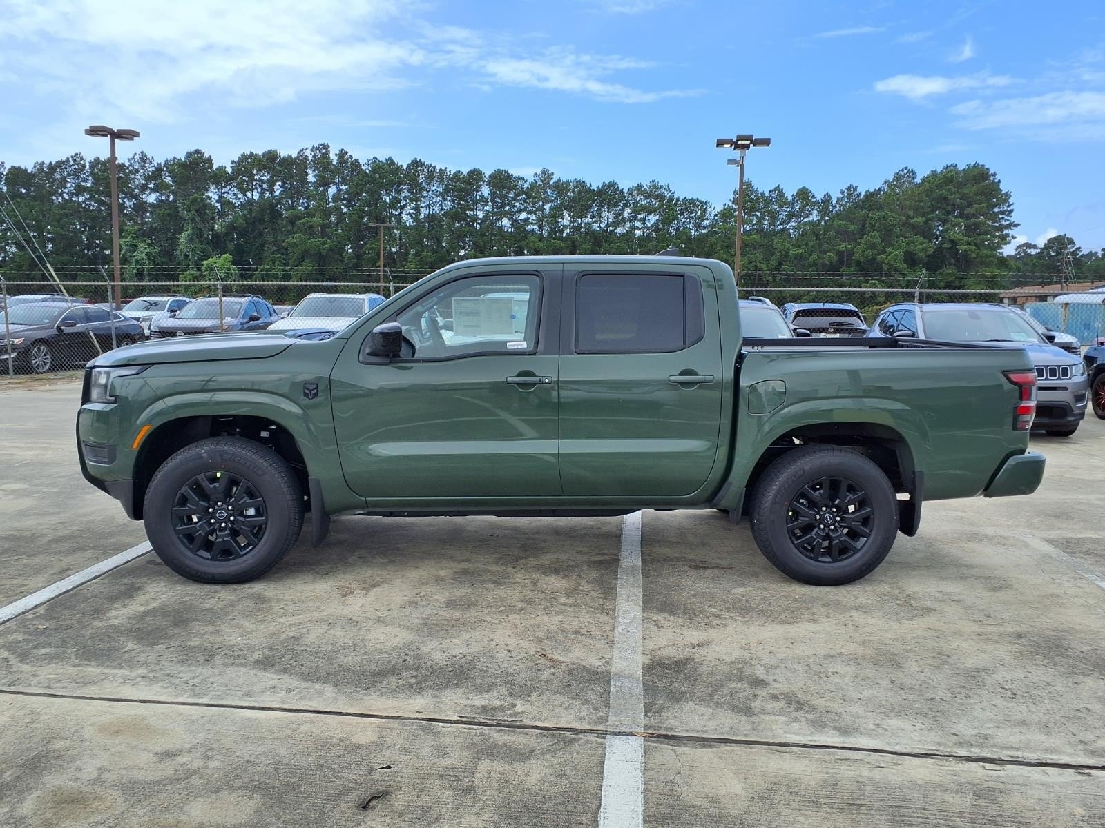 2026 Nissan Frontier SV Green at Robbins Nissan