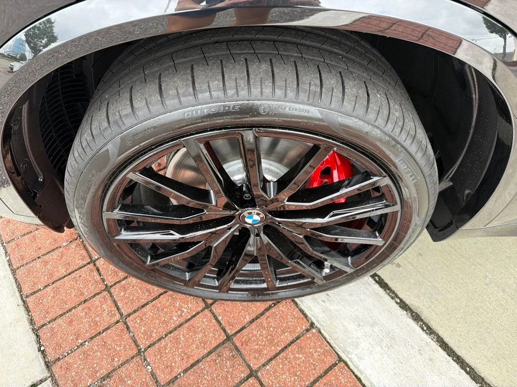 New 2026 Black Sapphire Metallic BMW M60i image 9