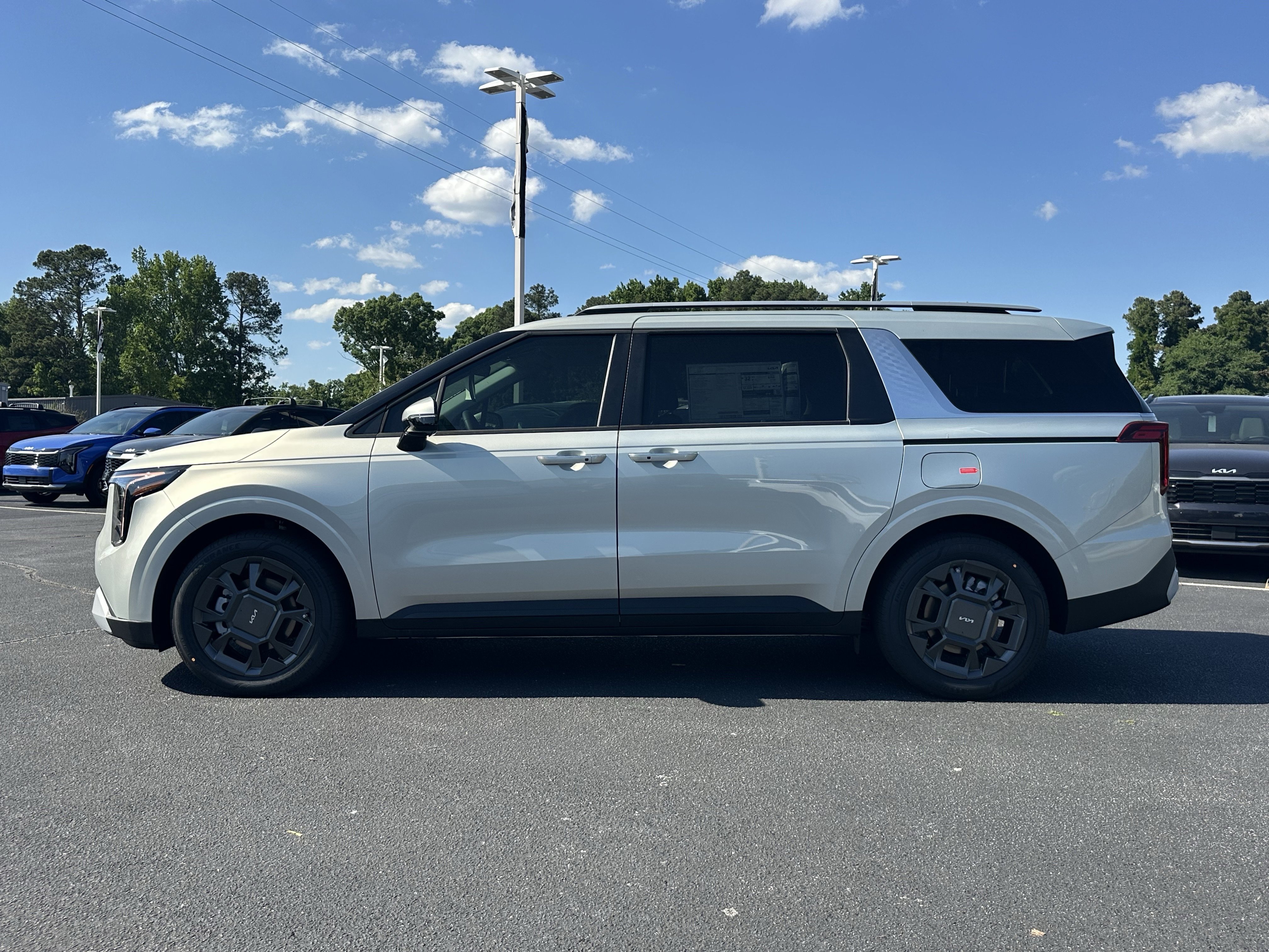 New 2026 Ivory Silver Kia EX image 5