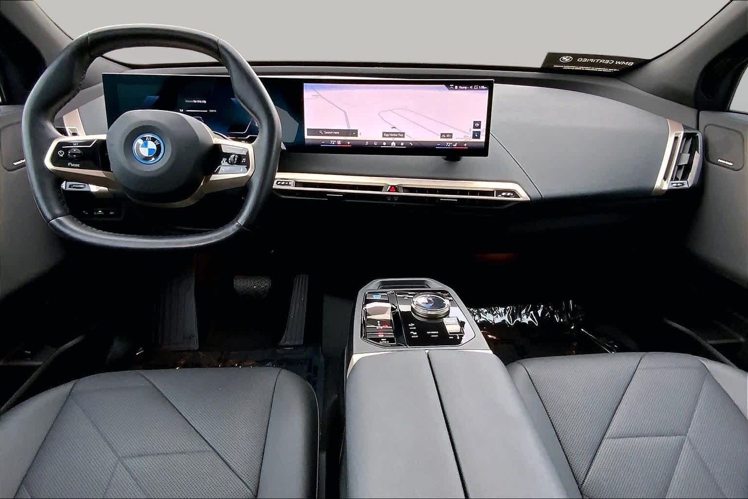 Used 2024 Black Sapphire Metallic BMW xDrive50 image 14