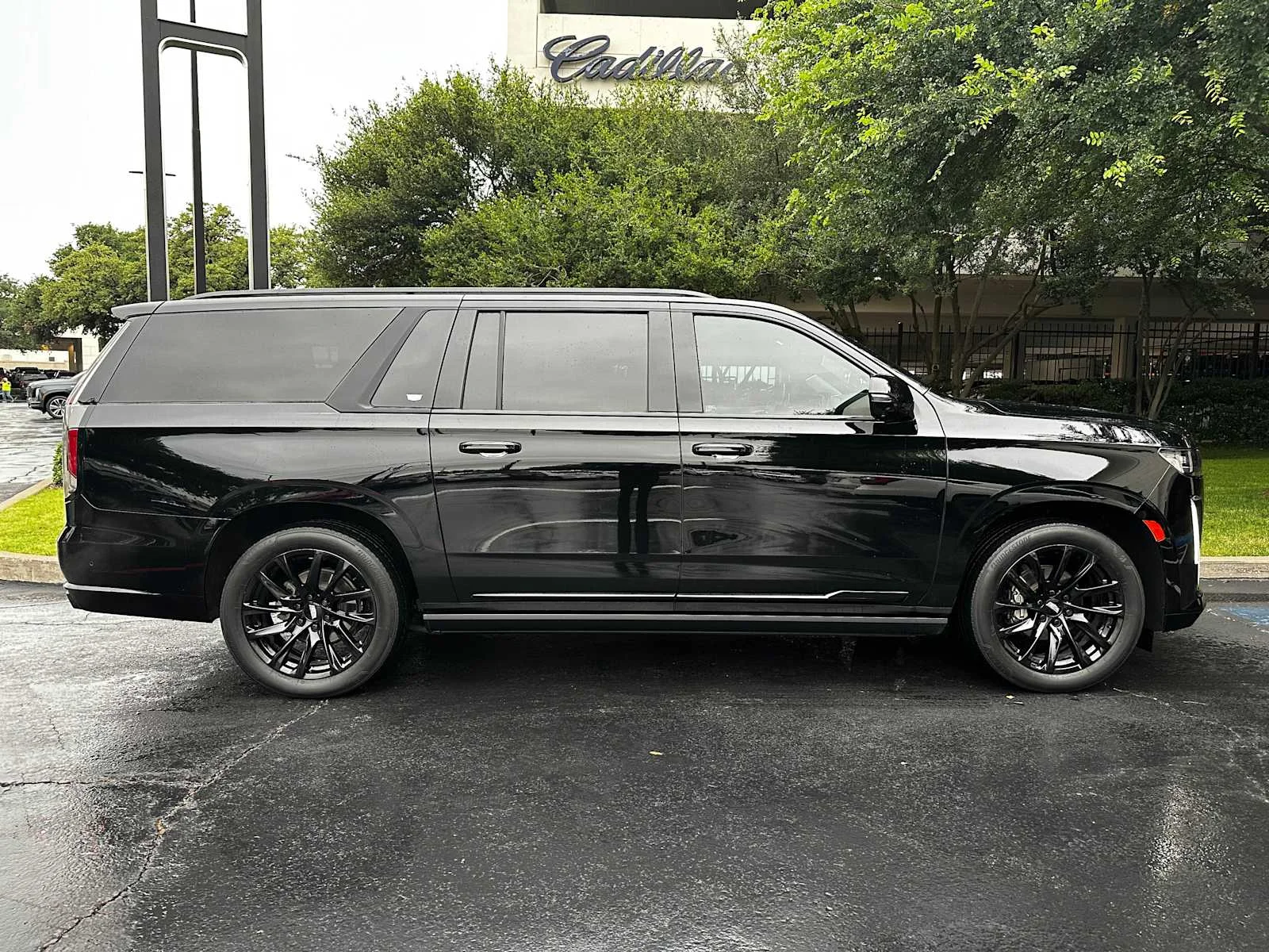 Used 2022 Black Raven Cadillac Sport image 6