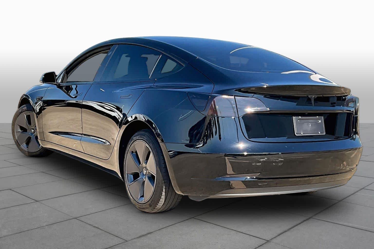 Used 2023 Solid Black Tesla  image 10