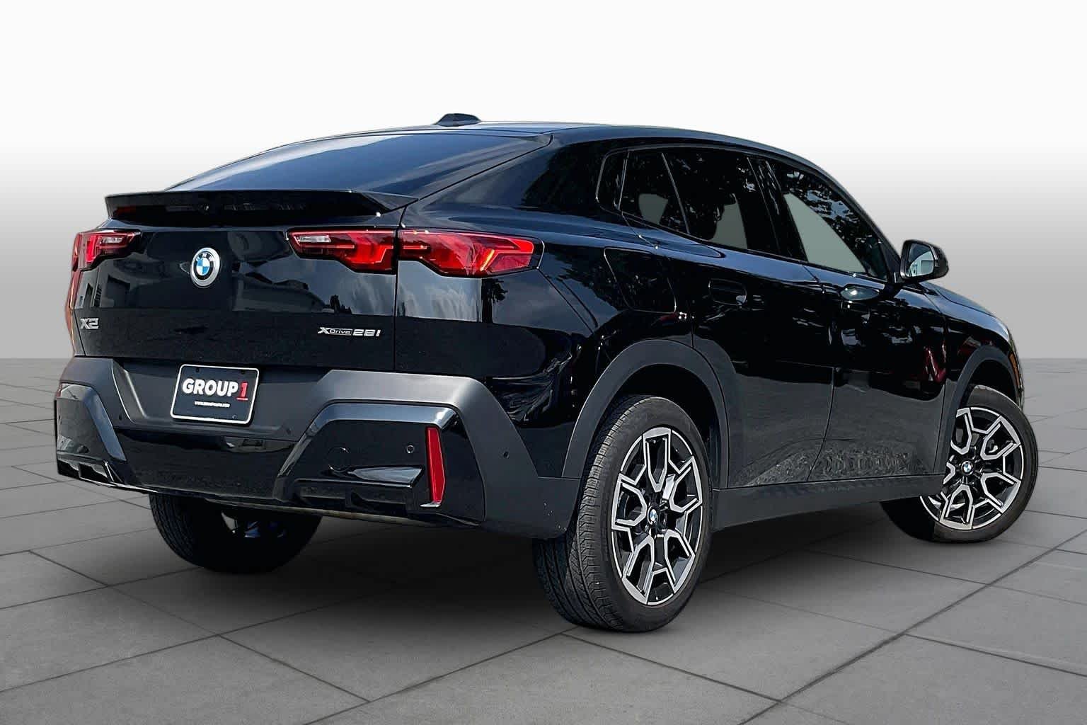 Used 2026 Black Sapphire Metallic BMW xDrive28i image 12