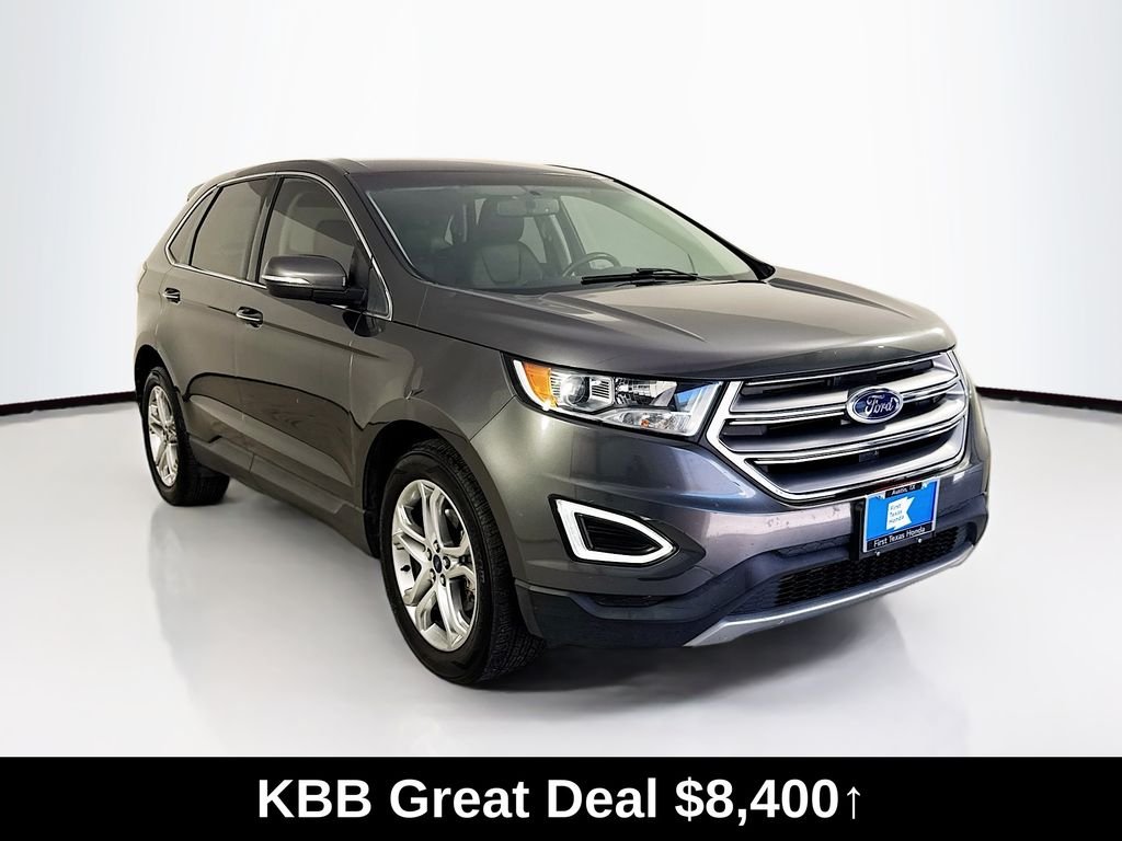 Used 2016 Gray Metallic Ford Titanium image 1