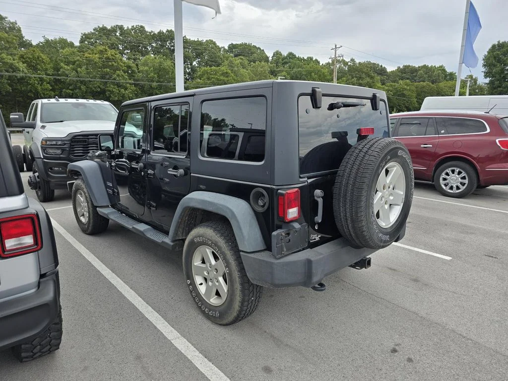 Used 2014 Black Clearcoat Jeep Sport image 3