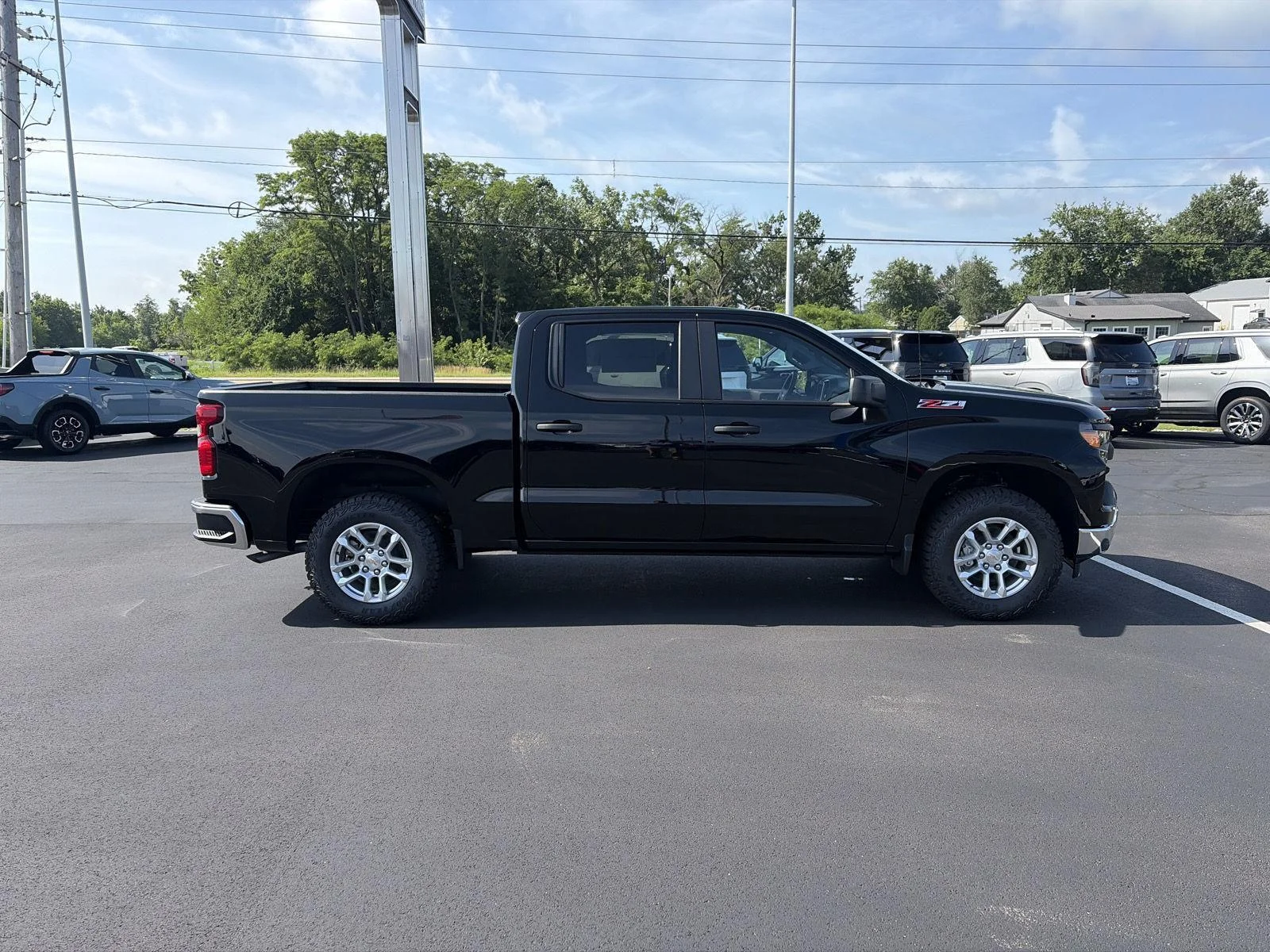New 2026 Black Chevrolet Work Truck image 2