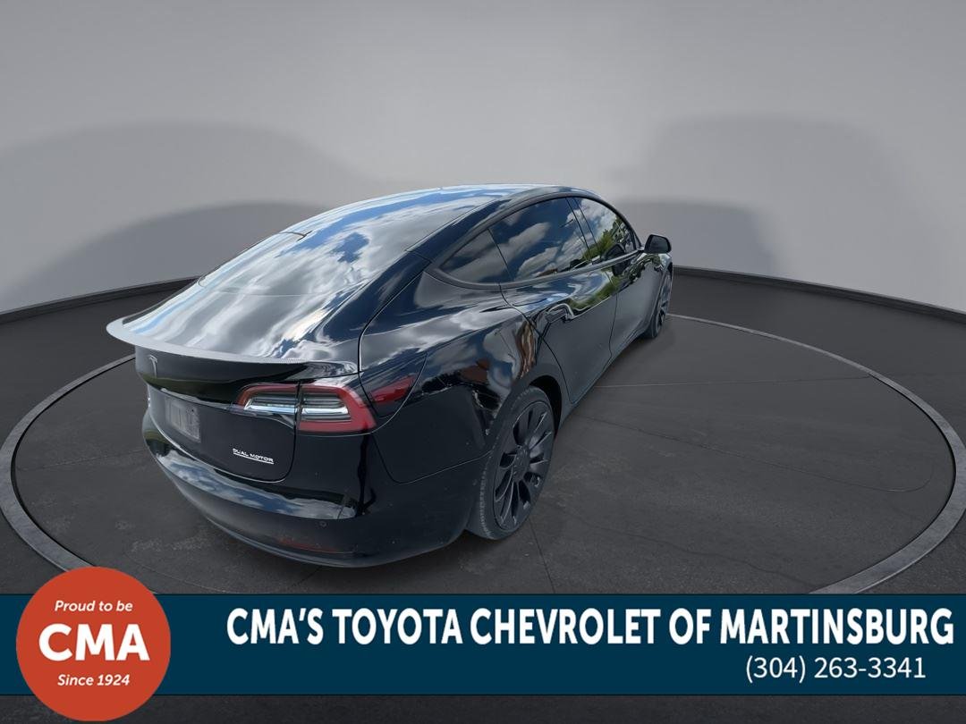 Used 2022 Solid Black Tesla Performance image 8