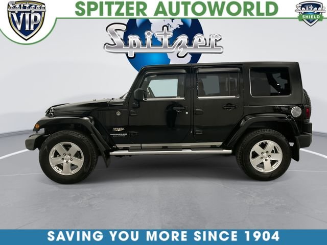Used 2009 Black Jeep Unlimited Sahara image 6