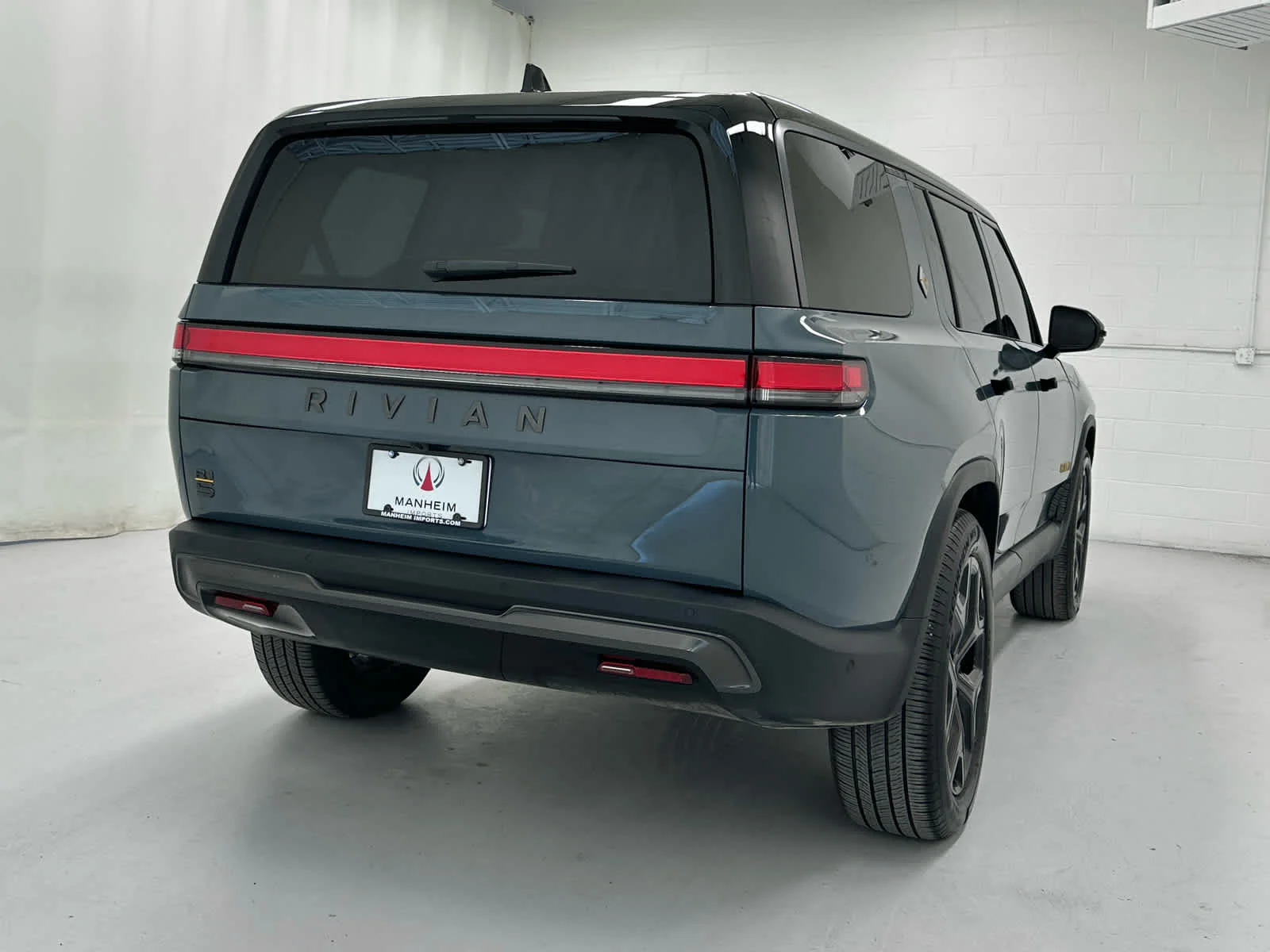 Used 2025 Storm Blue Rivian Ascend image 6
