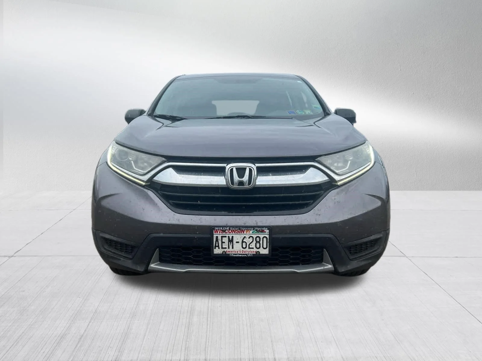 Used 2019 Honda CR-V LX with VIN 2HKRW6H3XKH202034 for sale in Coon Rapids, MN