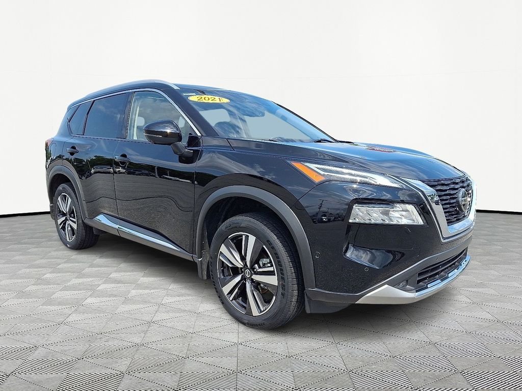 Used 2021 Black Nissan Platinum image 1