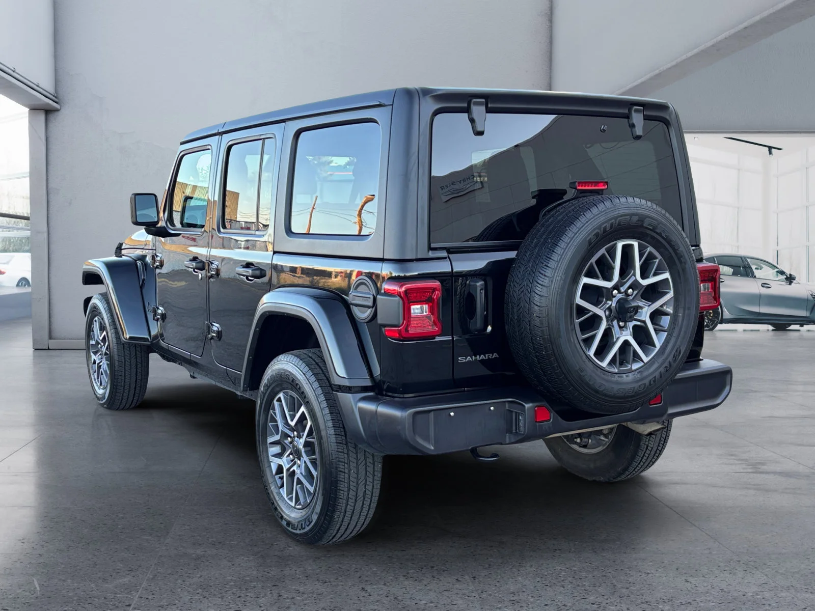 Used 2026 Diamond Black Crystal Pearl Jeep Sahara image 3