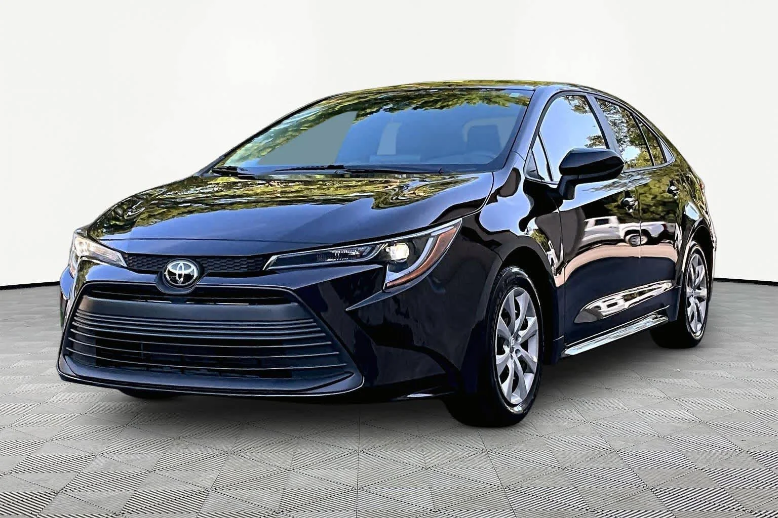 Used 2025 Midnight Black Metallic Toyota LE image 2