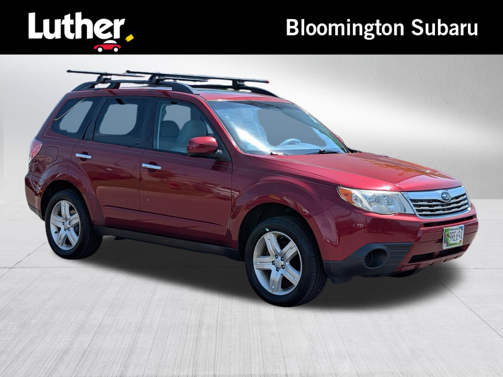Used 2010 Camellia Red Pearl Subaru 2.5X Premium image 1