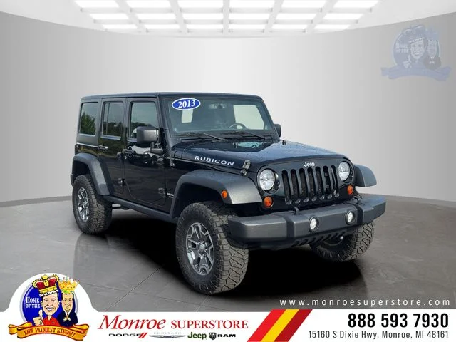Used 2013 Black Jeep Unlimited Rubicon image 1
