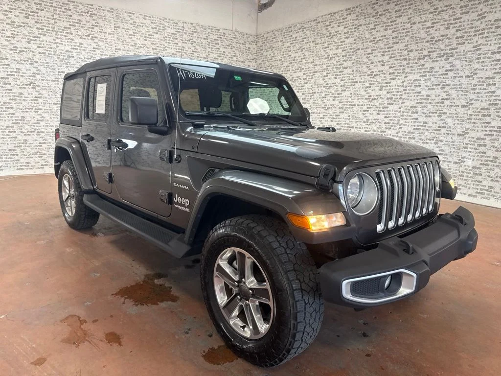 Used 2020 Granite Crystal Metallic Clearcoat Jeep Unlimited Sahara image 1
