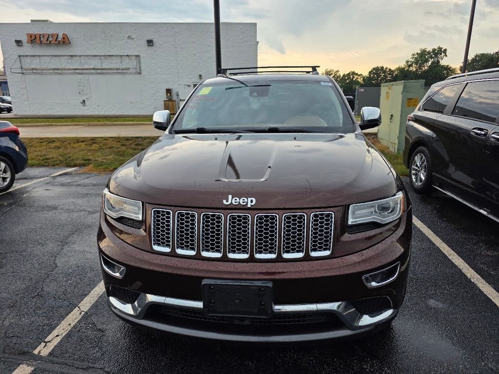 Used 2015 Deep Auburn Pearlcoat Jeep Summit image 1