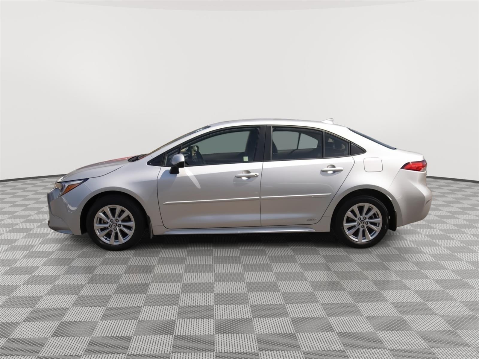 Used 2024 Classic Silver Metallic Toyota Hybrid LE image 19