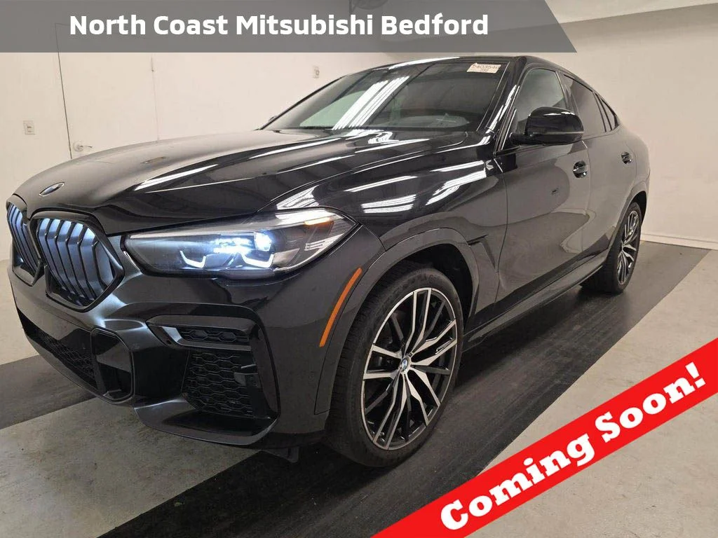 Used 2023 Black BMW xDrive40i image 1
