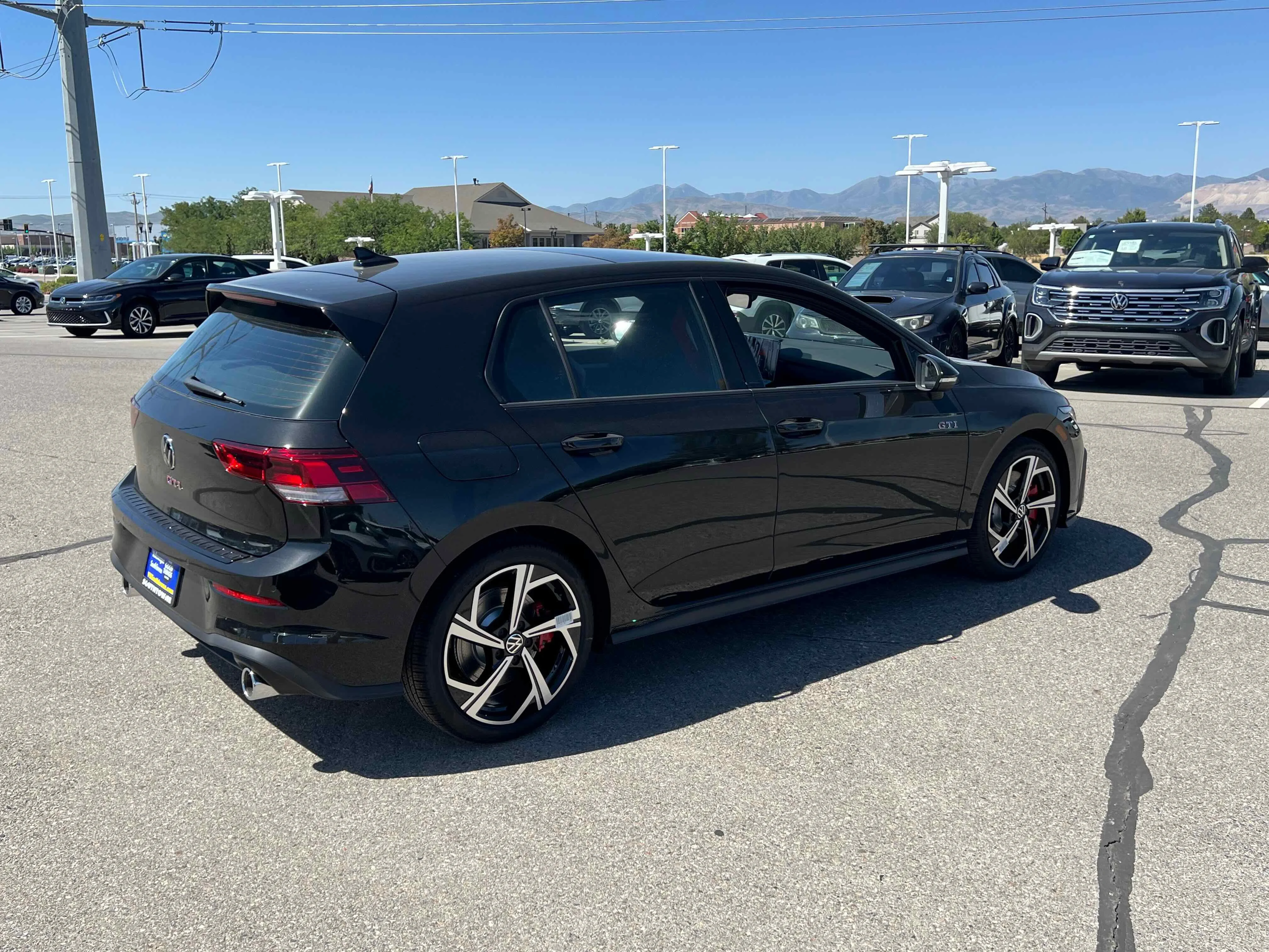 New 2025 Black Volkswagen SE image 13