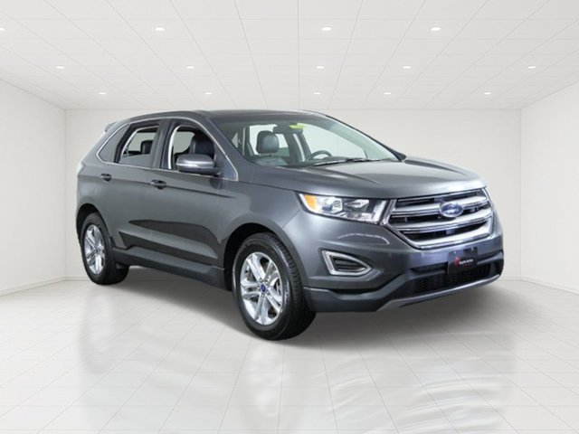 Used 2016 Gray Ford SEL image 1