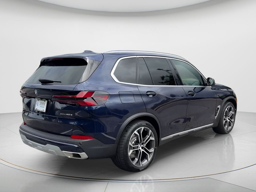 New 2026 Tanzanite Blue II Metallic BMW xDrive50e image 9