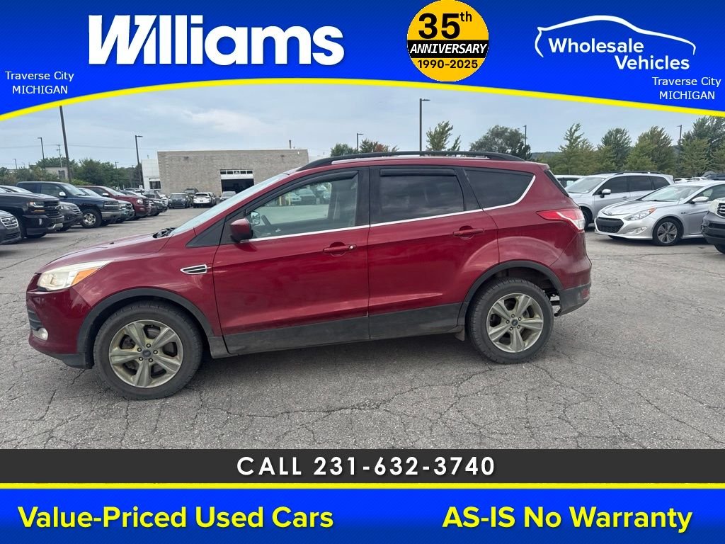 Used 2015 Ford Escape SE with VIN 1FMCU9G97FUB97837 for sale in Traverse City, MI