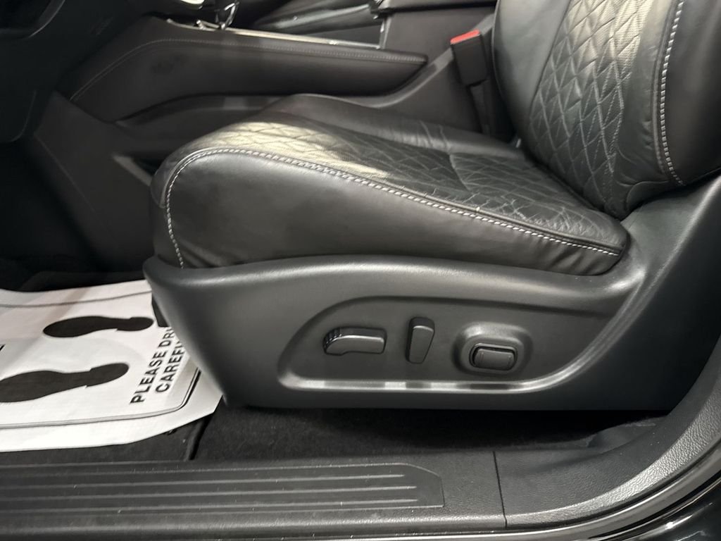 Used 2020 Super Black Metallic Nissan Platinum image 13