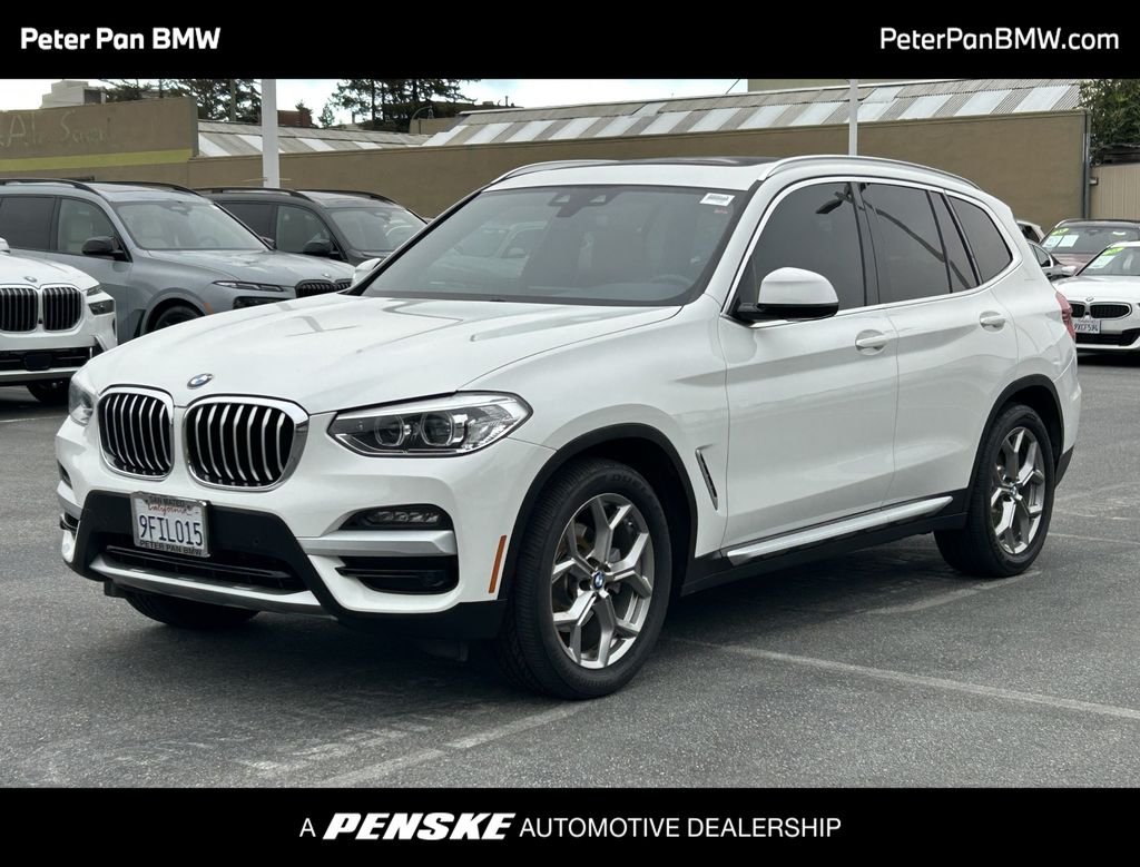 Used 2021 Alpine White BMW sDrive30i image 1