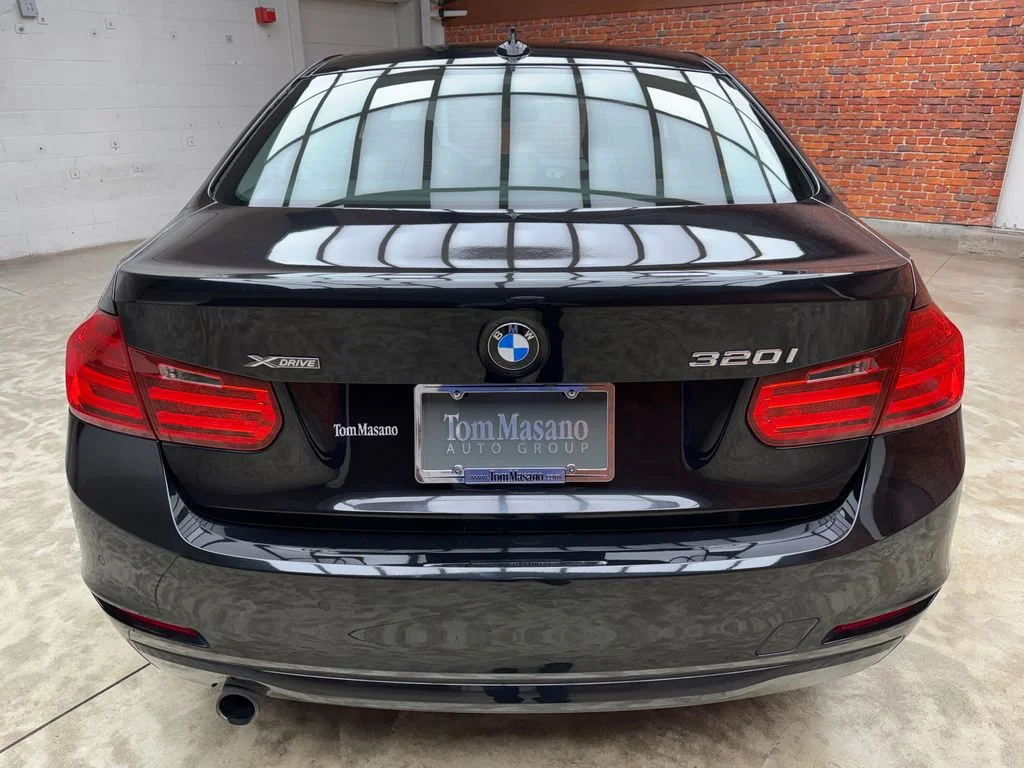 Used 2015 Black BMW 320i xDrive image 4