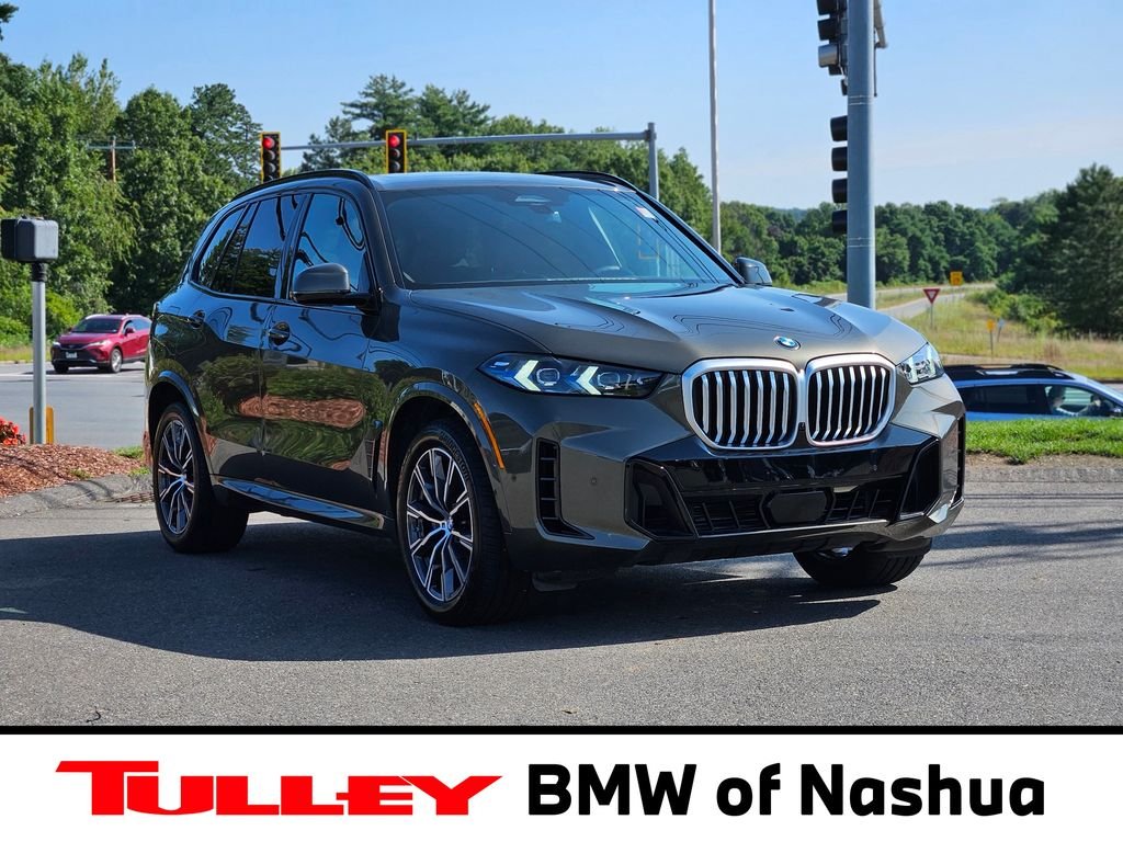 Used 2026 Manhattan Green Metallic BMW xDrive40i image 1