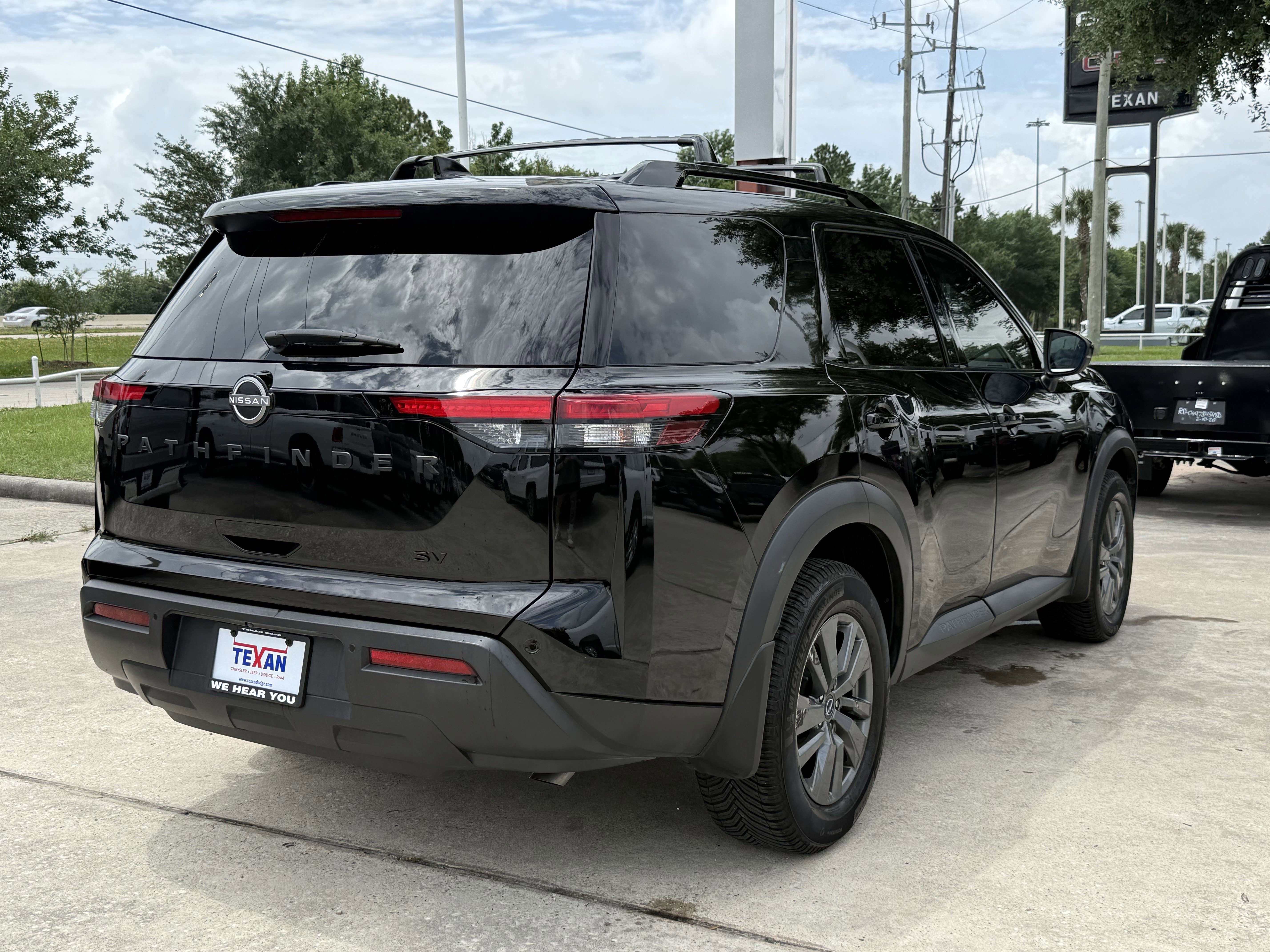 Used 2024 Super Black Nissan SV image 4