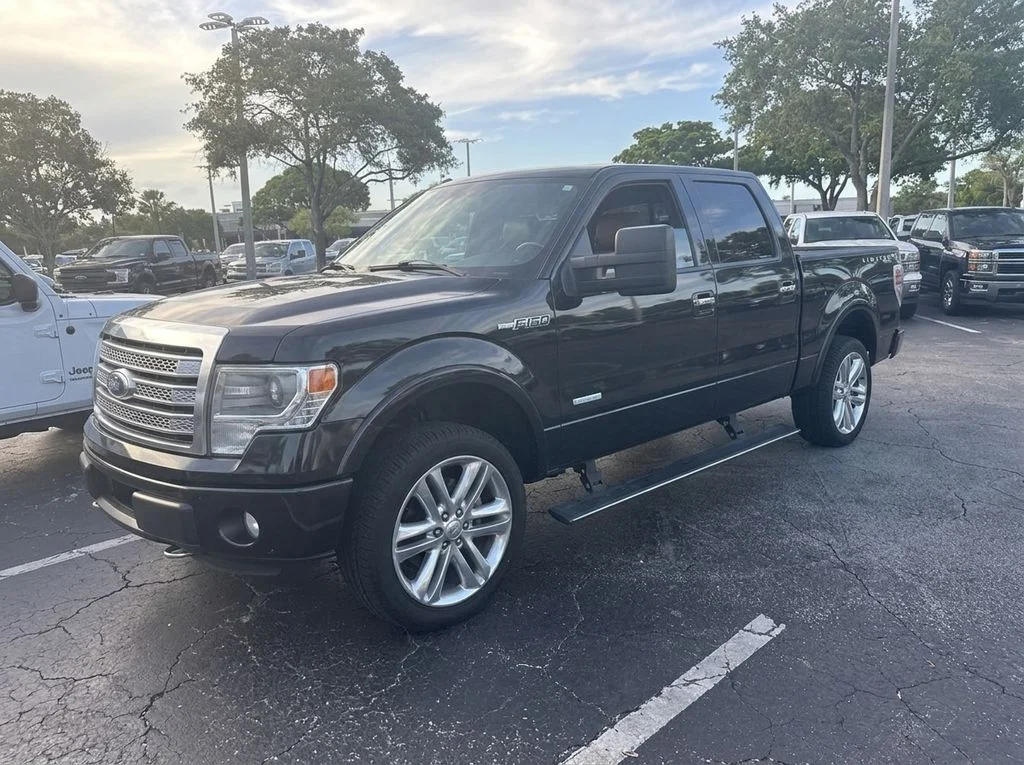 Used 2013 Black Ford Limited image 1