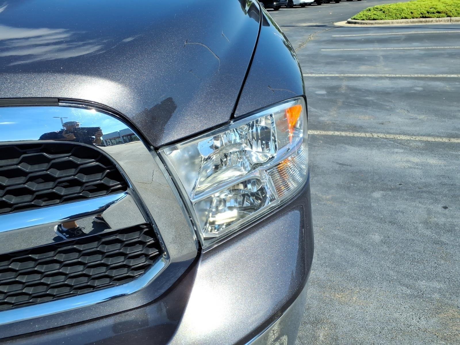 Used 2024 Granite Crystal Metallic Clearcoat Ram SLT image 14