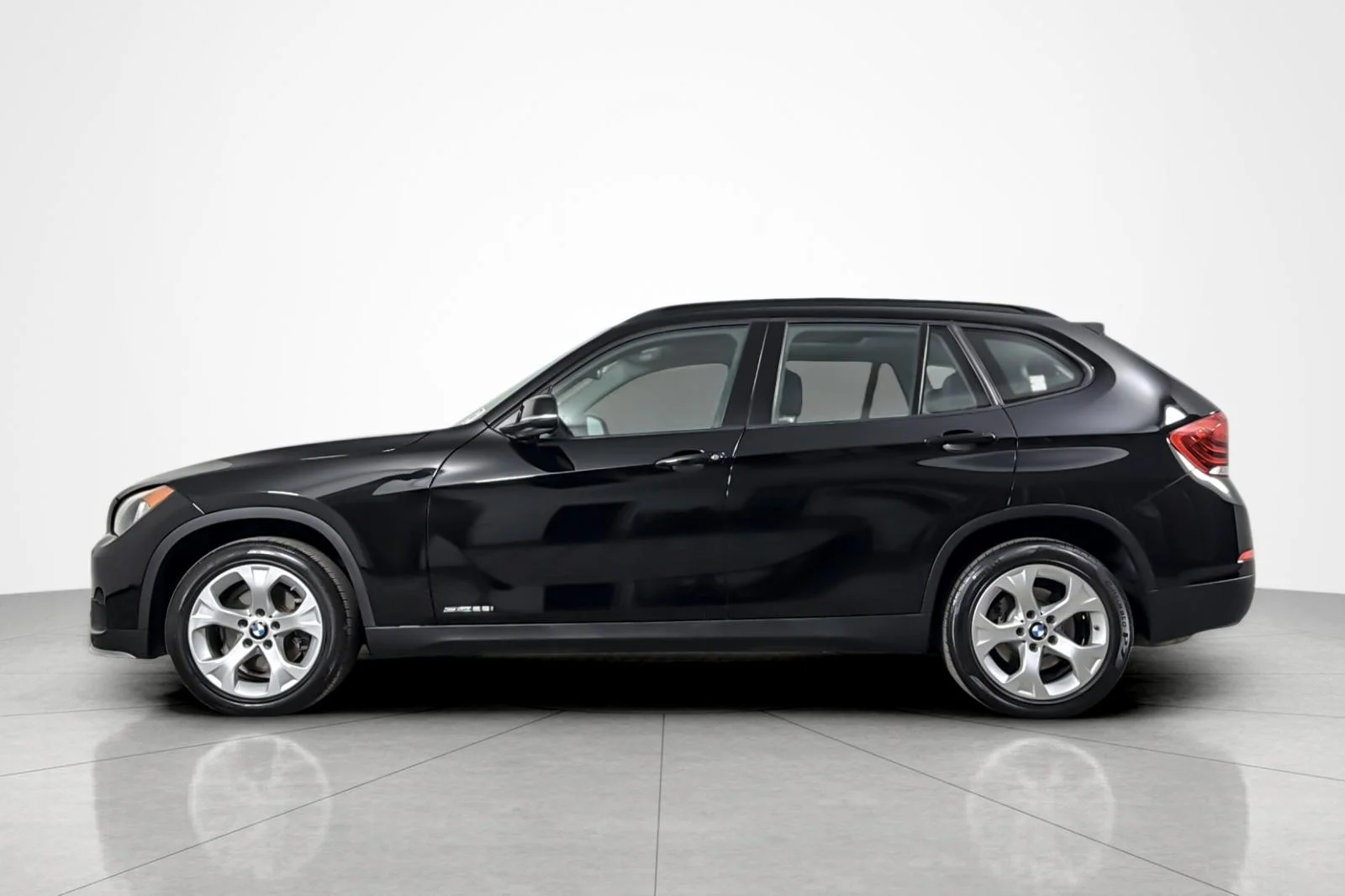 Used 2015 BMW X1 28i with VIN WBAVM1C59FV317274 for sale in Beverly Hills, CA