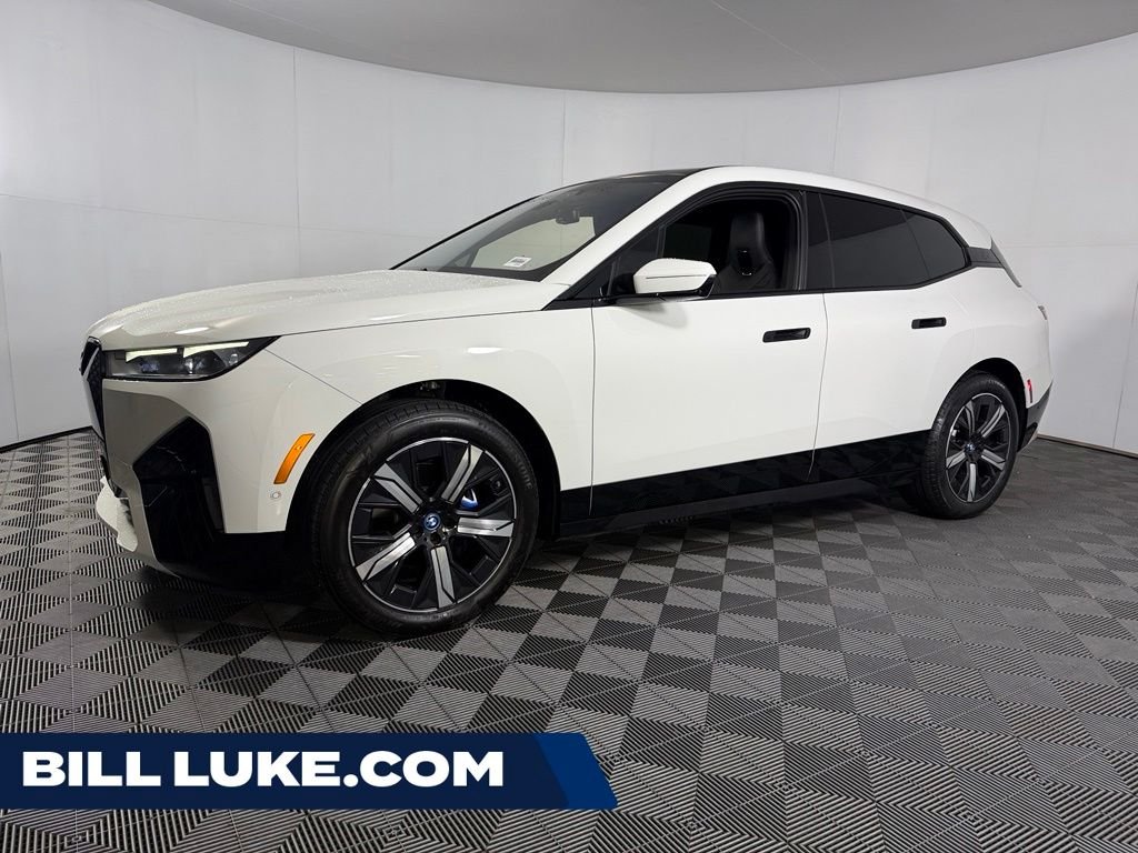 Used 2023 White BMW xDrive50 image 1