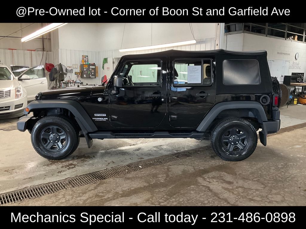 Used 2015 Black Jeep Unlimited Sport image 2