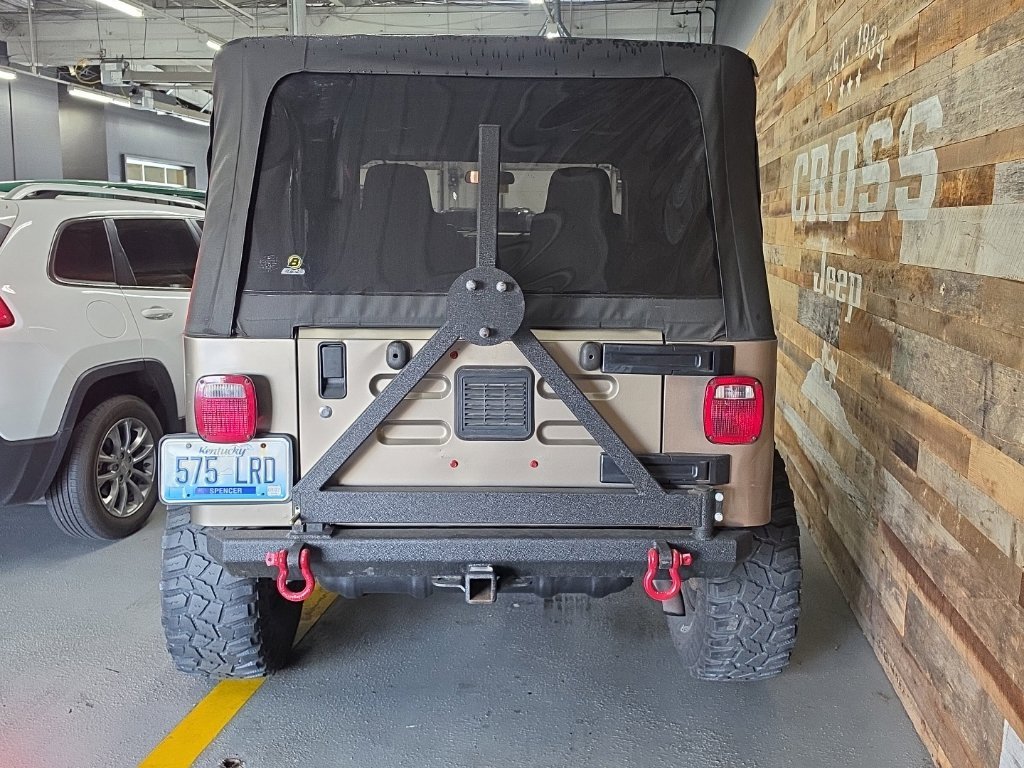 Used 2004 Light Khaki Metallic Jeep Unlimited image 5