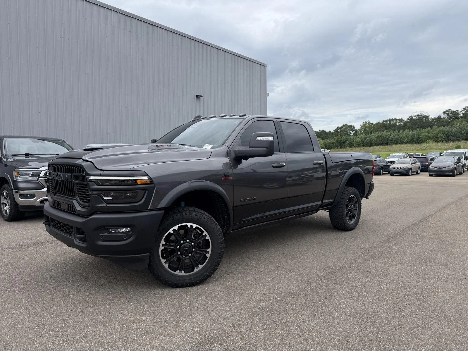 Used 2025 Granite Crystal Metallic Clearcoat Ram Rebel image 1
