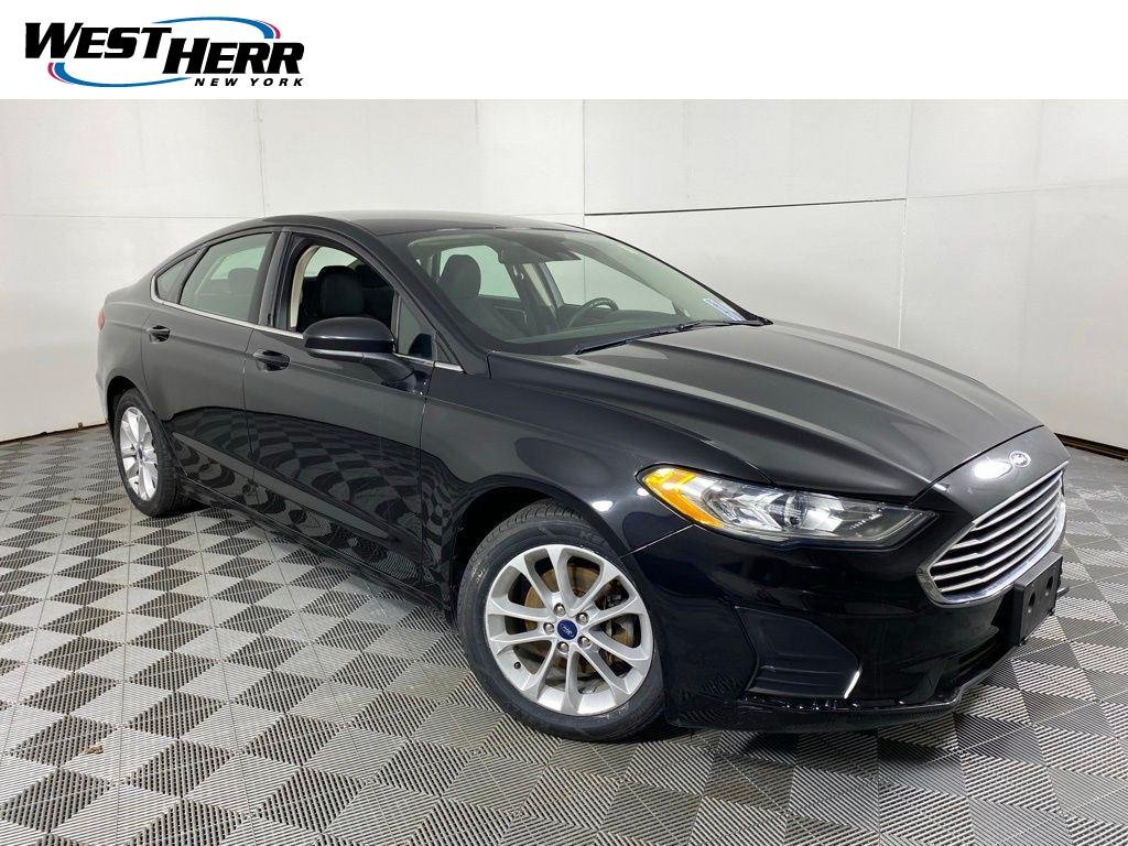 Used 2020 Black Metallic Ford SE image 1