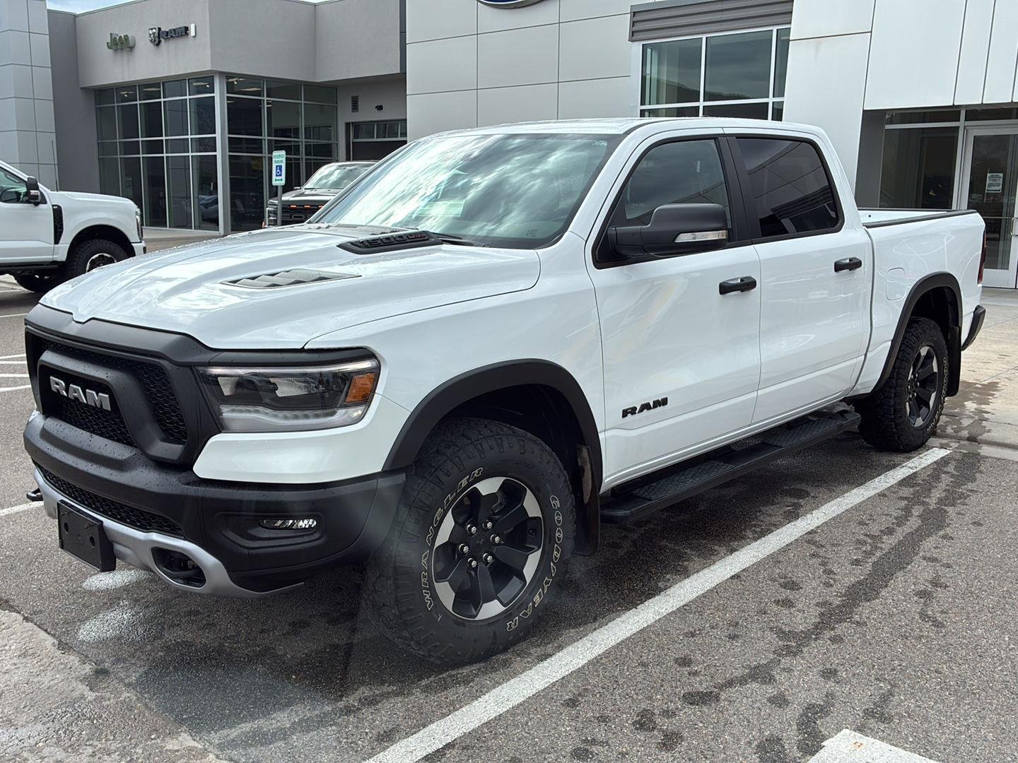 Used 2022 Bright White Clearcoat Ram Rebel image 1