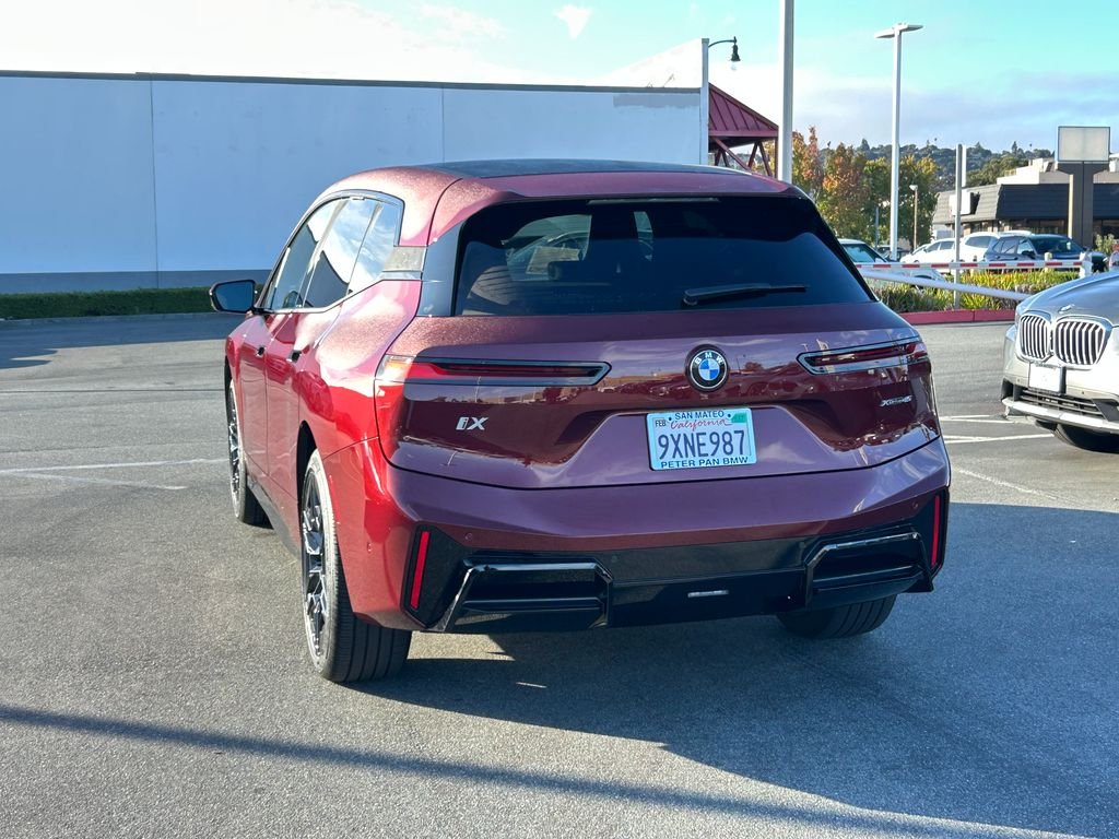 Used 2026 Red Metallic BMW xDrive45 image 3
