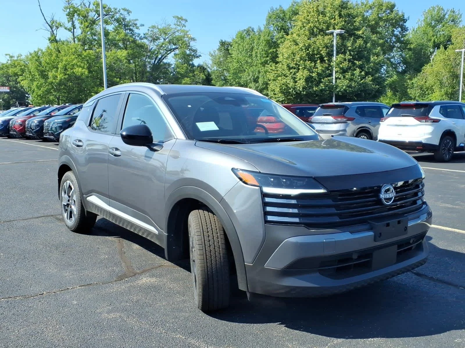 New 2026 Gun Metallic Nissan SV image 3