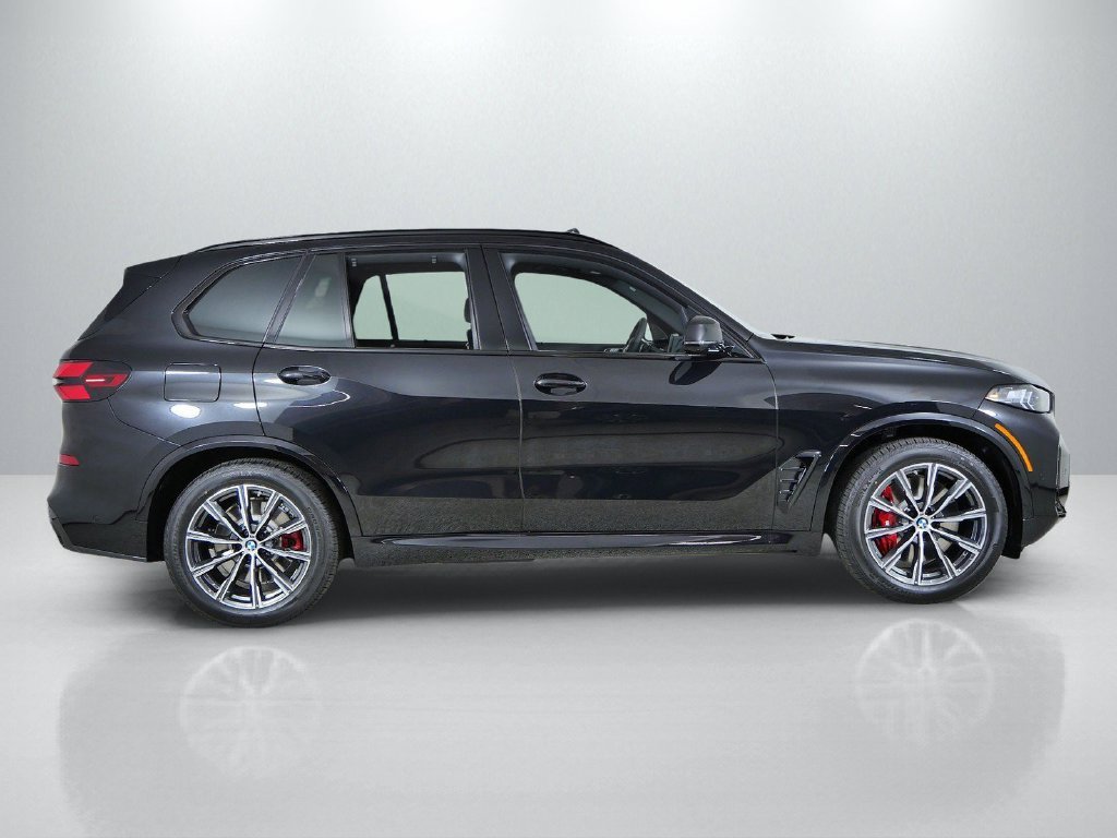 New 2026 Black Sapphire Metallic BMW xDrive50e image 8