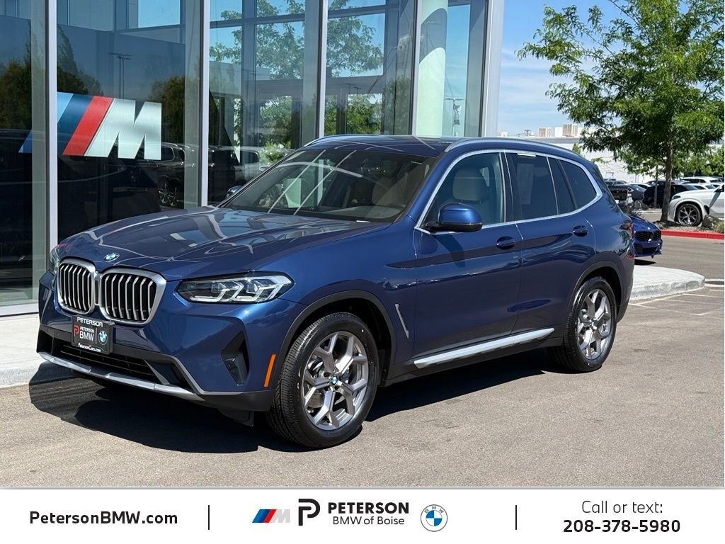 Used 2022 Blue BMW xDrive30i image 1