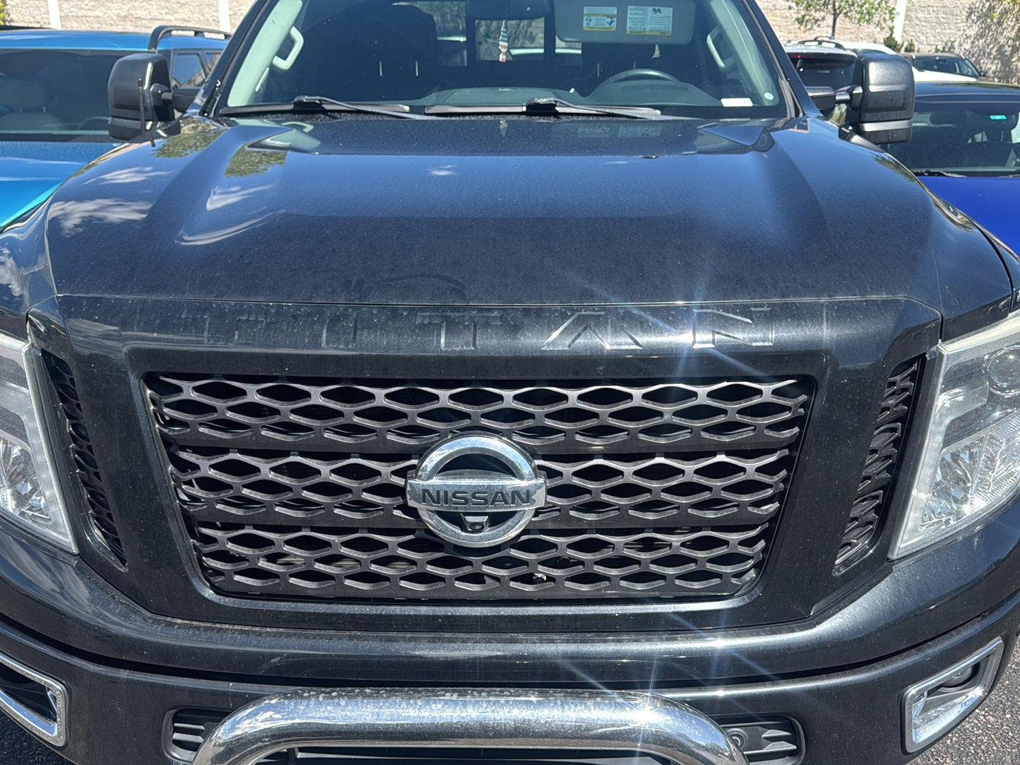 Used 2017 Magnetic Black Nissan PRO-4X image 1