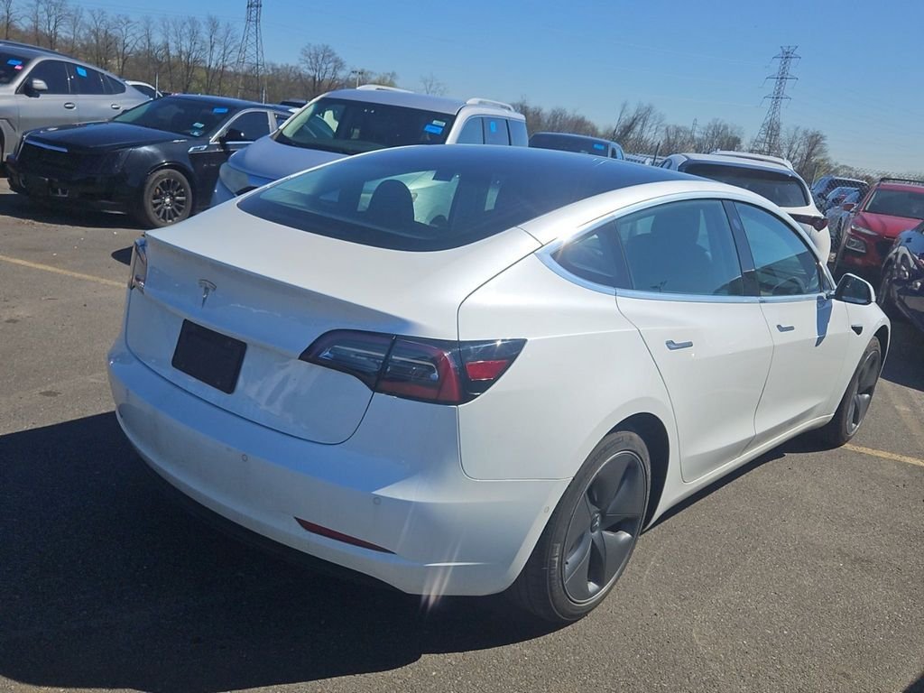 Used 2020 White Tesla Standard Range Plus image 4