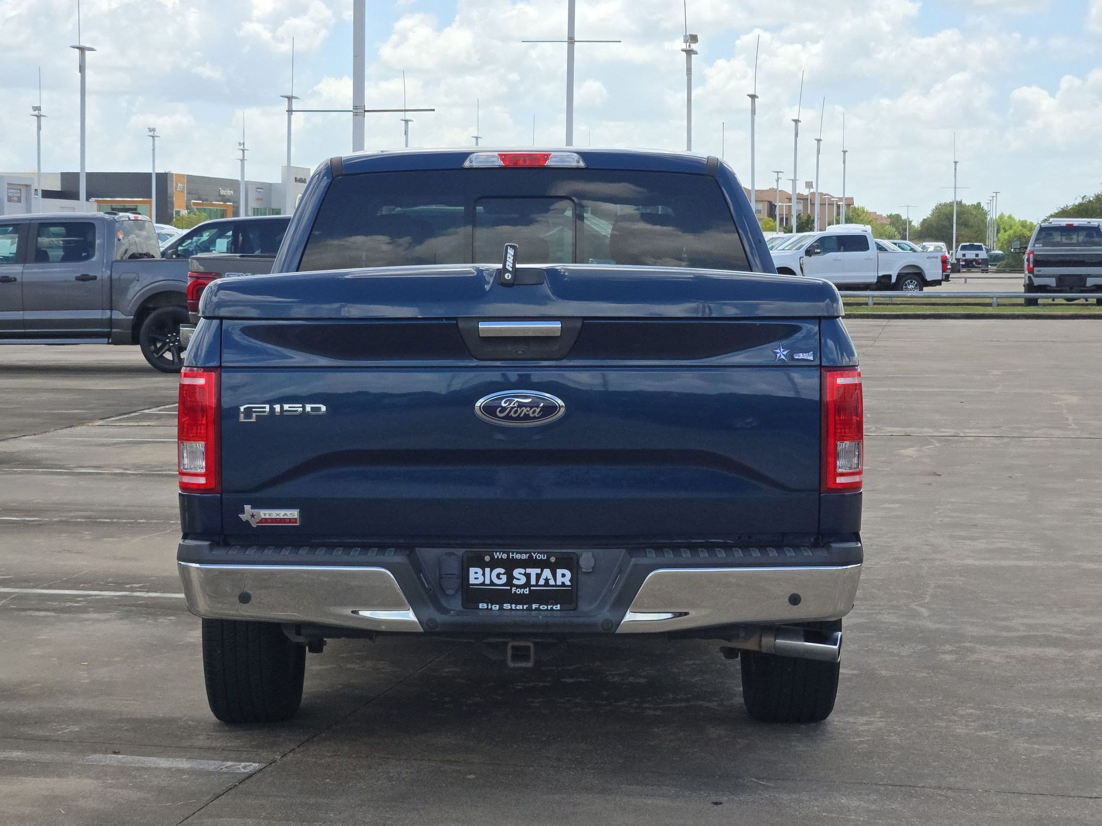 Used 2015 Blue Jeans Metallic Ford XLT image 4