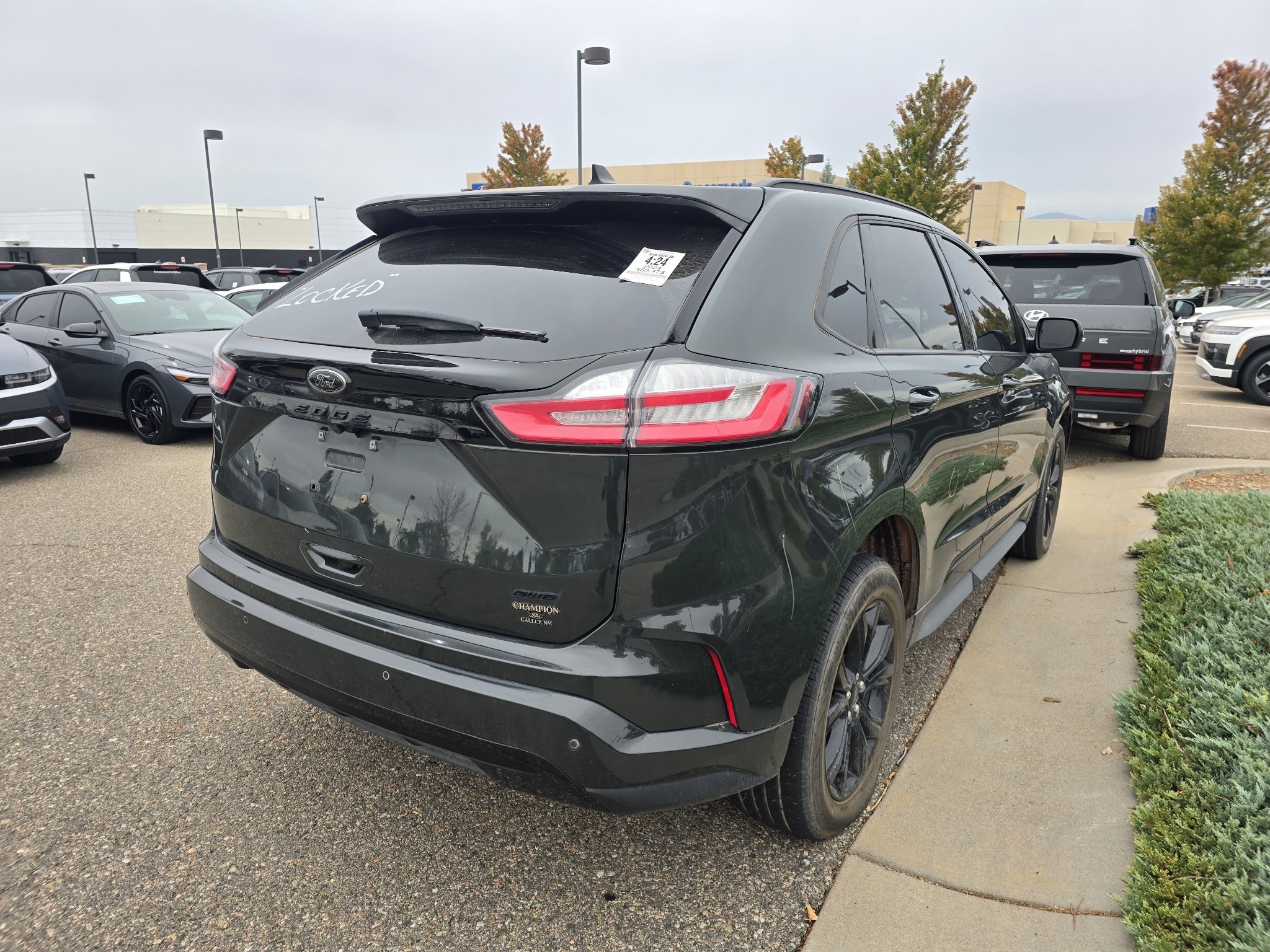 Used 2024 Forged Green Metallic Ford SE image 5