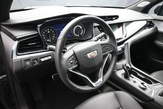 Certified Used 2025 Stellar Black Metallic Cadillac Sport image 9